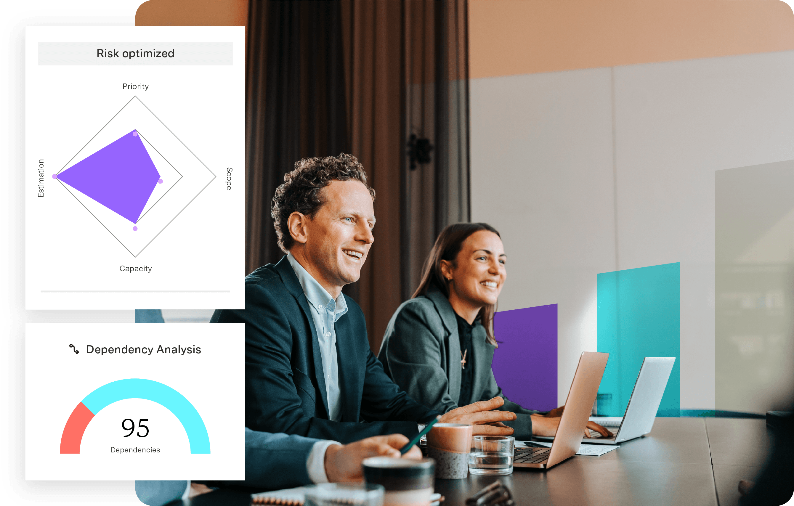 Group meeting at a table with laptops